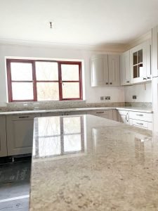 Colonial White Polished Sensa Granite Worktops and Splashbacks | Residential Kitchen Project by MGD