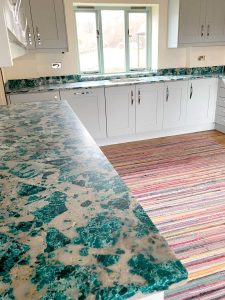 Breccia Emerald worktop with room in background
