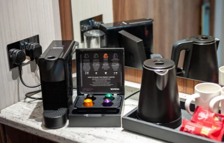 Crowne Plaza Guest Room Granite Worktops pictures with coffee pods and kettle.