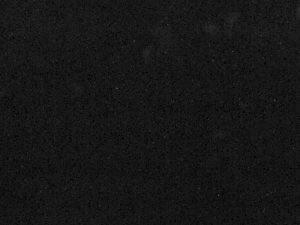 Fine-grained black quartz compound stone with grey grains spread over the surface - Black Crystal Unistone swatch