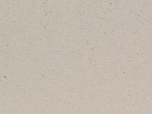 Beige-grey quartz surface with a granular stone-like appearance - Divinity Ivory Diresco swatch