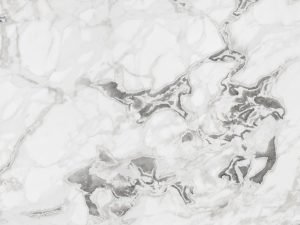 white swirling marble-style sintered stone surface swatch - neolith whitehaven