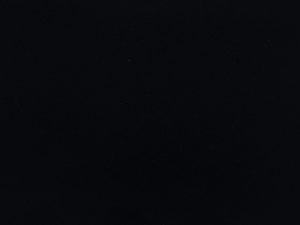 Plain black quartz surface - Technistone Taurus Black swatch