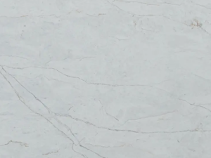 Fine-grained white-grey quartz compound stone with vague darker grey (wide) veins spread over the surface - Traonyx Unistone swatch