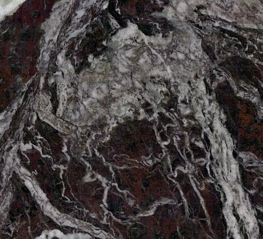 Unveil the beauty of Rosso Levanto Marble, an Italian masterpiece with a unique burgundy to purple background and white veins.