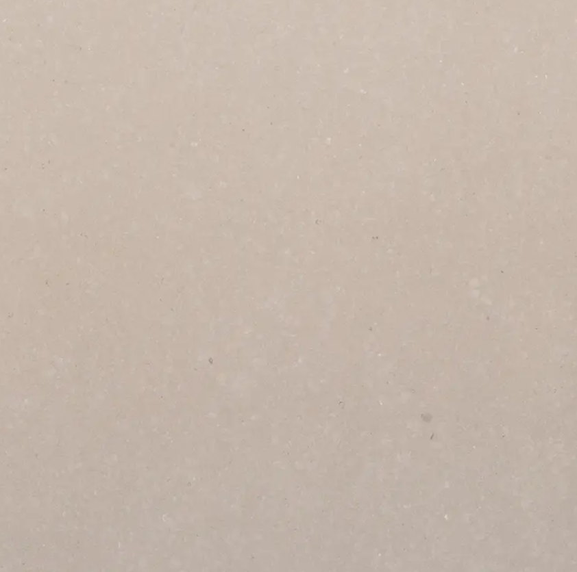 Fine-grained grey quartz compound stone with paler rounded fragments spread over the surface - Jura Grey Unistone swatch