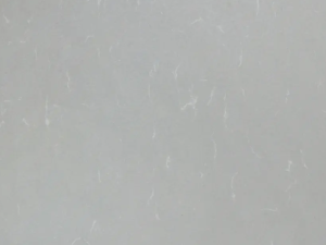 Fine-grained grey quartz compound stone with paler veins spread over the surface - Grey Savoye Unistone swatch