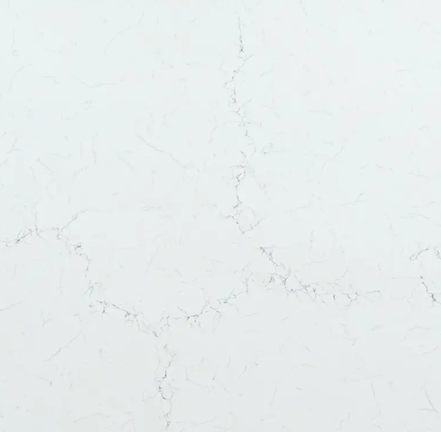 Fine-grained white quartz compound stone with darker grey veins spread over the surface - Carrara Misterio Unistone swatch