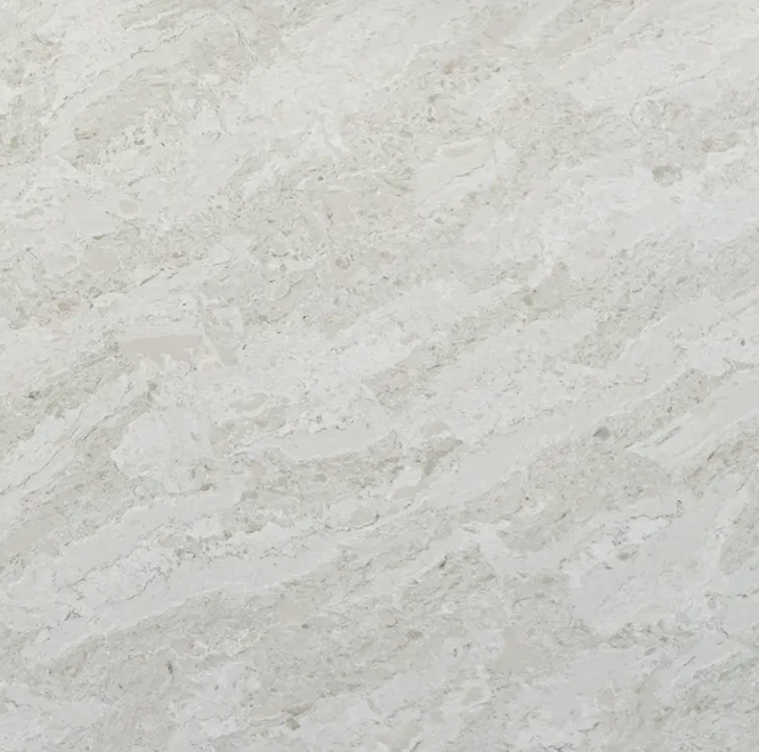 Fine-grained beige quartz compound stone with darker layers/veins spread over the surface - Taj Mahal Unistone swatch