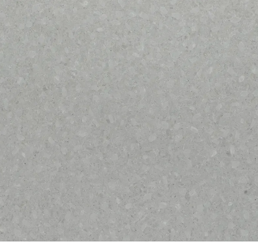 Fine-grained pale grey quartz compound stone with darker structures spread over the surface - Terreno Unistone swatch