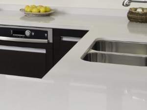 White-coloured Cimstone 402 Arcadia quartz worktops with black cabinets and appliances beneath.