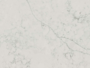 Fine-grained white quartz surface with delicate grey veining across it with smaller irregular veins in patches.Mystery White Technistone swatch