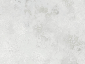 Matte-finish grey quartz surface with cloudy white and light grey veins across the face - Technistone Ambiente Light swatch