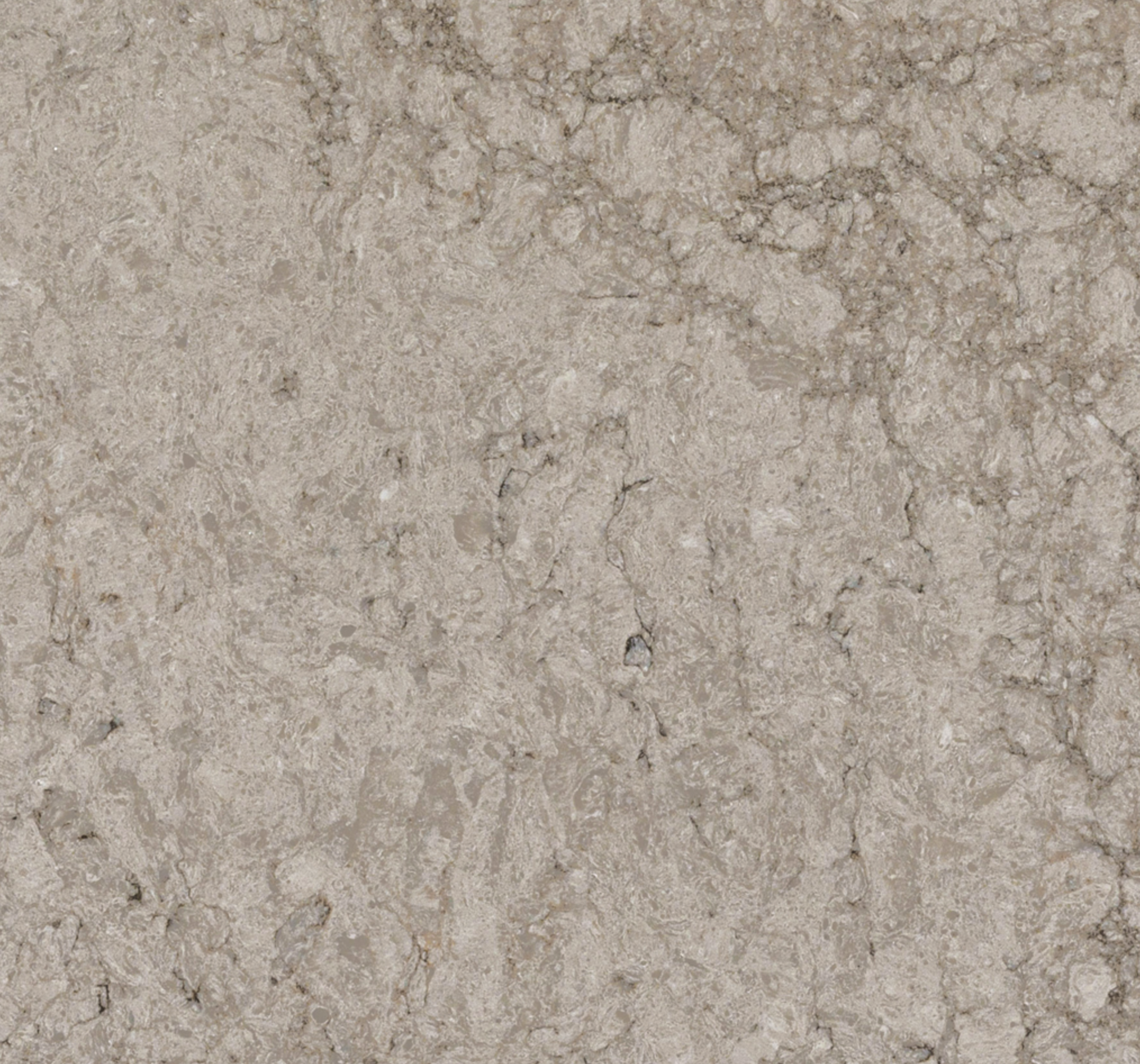 6046 Moorland Fog – Quartz Worktop swatch. Rich Veined Beige Polished Quartz Worktop A densely rich, creamy, light-coloured canvas, flushed with a touch of taupe and swirly veins in foggy browns and greys.