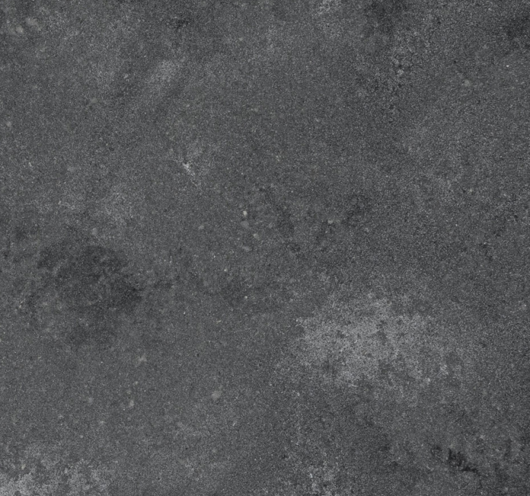 4033 Rugged Concrete – Mineral Worktop swatch. Industrial Styled Grey Rough Concrete Style Mineral Worktop Dramatic gradients of robust concrete greys, flushed with white-haze patinas and industrial-inspired imperfections that are accentuated by a deep textured finish.