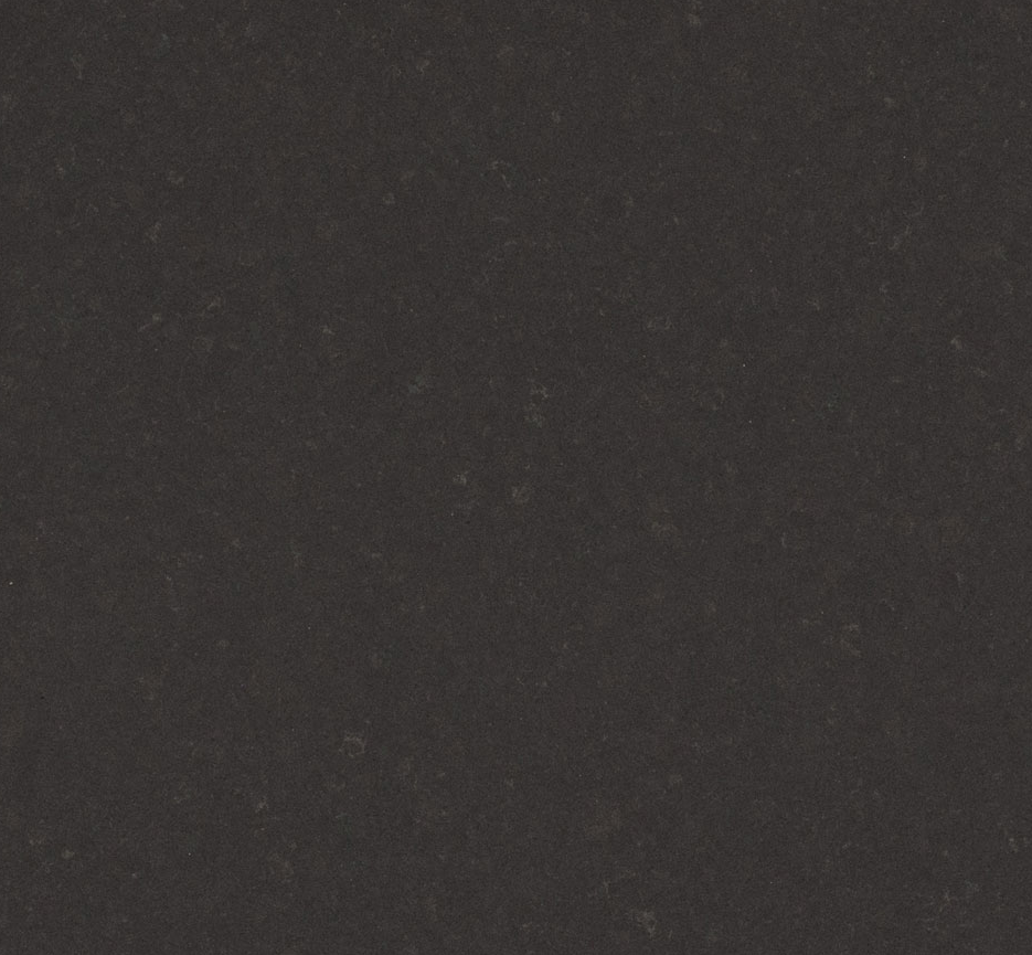 4120 Raven – Quartz Worktop swatch. Smoky Speckled Black Polished Quartz Worktop A play of light on smoky-slate greys, delicately blending a two-toned surface slightly dappled for a dramatic effect.