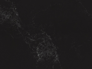 5101 Empira Black – Mineral Worktop swatch. Veined Black Polished Mineral Worktop A deep, dark stone, mysterious and opulent, with touches of fine white veining that flow organically across it, contrasting and blending into a one-of-a-kind surface.