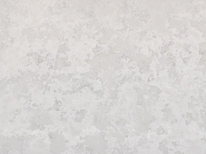 Fine-grained white-grey quartz compound stone with vague darker grey veins spread over the surface - Naxos Unistone swatch