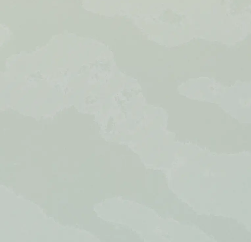 Fine-grained white-grey quartz compound stone with vague darker grey veins spread over the surface - Olympus White Unistone swatch