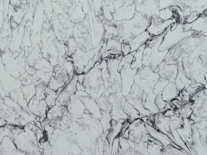 White base with dark grey irregular veins in a swirling pattern - White Fusion Unistone swatch