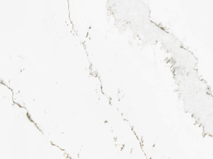 Fine-grained white quartz surface featuring brown and grey veining - Technistone Calacatta Volegno swatch