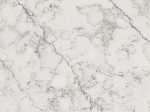Fine-grained white quartz surface with distinctive grey veining running diagonally across the face and irregular cloudy veining running across it - Technistone Roman Ricco swatch