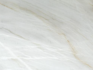 Product photo: Calacatta Raphael Quartzite is a high-end natural stone prized for its stunning appearance and exceptional durability. This luxurious quartzite showcases a soft white background adorned with delicate grey veining, reminiscent of the classic Italian Calacatta marble. The elegant veining patterns vary from subtle and wispy to bold and dramatic, making each slab a unique masterpiece of nature.