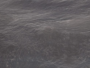 Product photo: Cinder Black Quartzite is a striking natural stone known for its deep, rich black colour accented by subtle, elegant veining. This unique blend of hues creates a sleek and modern aesthetic, perfect for adding a touch of sophistication to any space. The stone's luxurious appearance is reminiscent of a night sky, making it an ideal choice for those seeking a bold yet timeless look.