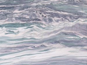 Product photo: Fusion Wow Quartzite is an extraordinary natural stone that stands out for its vibrant and dramatic appearance. This quartzite is renowned for its striking mix of colours, including deep blues, rich greens, and warm rust tones, often interspersed with hints of gold and white. The result is a bold and eye-catching pattern that resembles an abstract painting, making each slab a unique work of art.