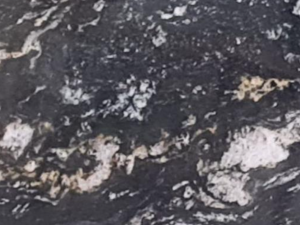 Product photo: Black Forest Granite is a captivating natural stone known for its dramatic and sophisticated appearance. This unique granite features a rich blend of black, white, and grey tones, creating a striking contrast that enhances any interior design. The intricate patterns and veining in the stone add depth and character, making each slab truly one-of-a-kind.