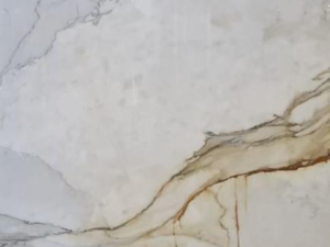 Product photo: Paonazzo Marble is a highly sought-after natural stone, known for its luxurious appearance and dramatic veining. This exquisite marble features a predominantly white base, intricately veined with striking patterns in shades of gold, grey, and sometimes hints of blue or green.