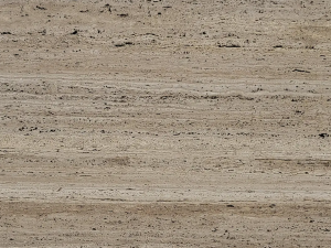 Travertino Titanium swatch - Brown-grey compact limestone (travertine) with pronounced lined drawing due to darker line structure. The drawing is very heterogeneous and especially band-shaped (horizontal and parallel; sawn perpendicular to layering). The surface contains small pores that are usually filled.