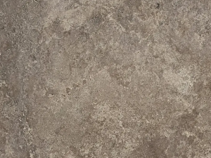 Travertino Nuvole swatch - Light brown compact limestone (travertine) with typical clouded open-pore structure (cut parallel to the layering).