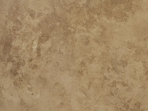 Pietra Di Calma swatch - Beige compact limestone ("travertine") with "cloud-shaped" structure due to typical pore structure. The surface presents small openings that may or may not be filled (pores are usually filled when installed with adapted grout). Fossils can be present throughout the material.